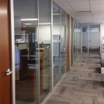 Anodized glass offices with veneer swing doors