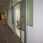 Double aluminum frame sliding doors with Flex series walls and opaque glass inserts