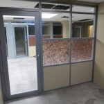 Offices with aluminum framed glass insert swing doors #0343