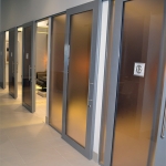 Metal framed sliding glass door healthcare installation #0608