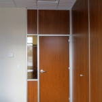 Office with solid wood panels matching door and glass sidelight #0354