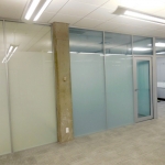 Privacy glass frosted full height wall system in University classroom application #0389