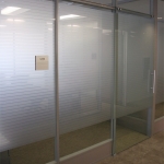 Sliding frameless glass door with matching privacy film #0664