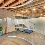 Curved glass conference room wall with 3M window film #0669