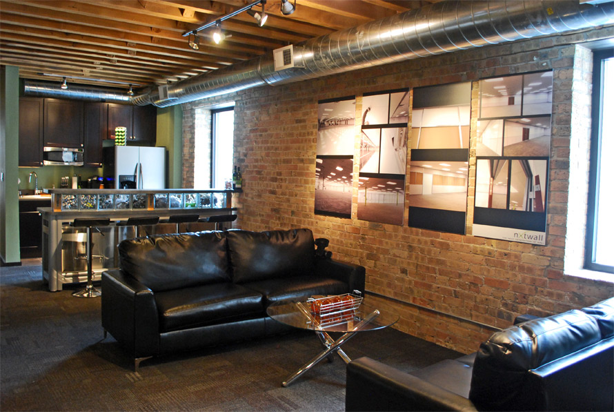 NxtWall lounge area and bar with timeline art gallery display #0255