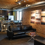 NxtWall lounge area and bar with timeline art gallery display #0255