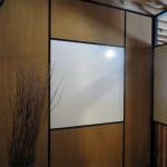 Integrated whiteboard wall with black wall trim and glazing bead #0270