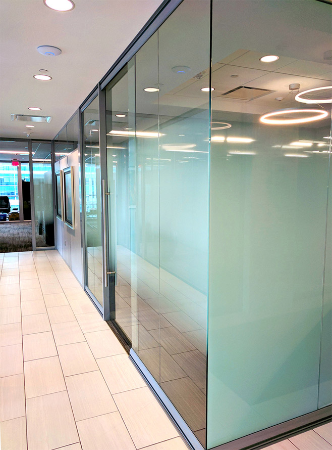 Glass offices with decorative window film and open corner #0937