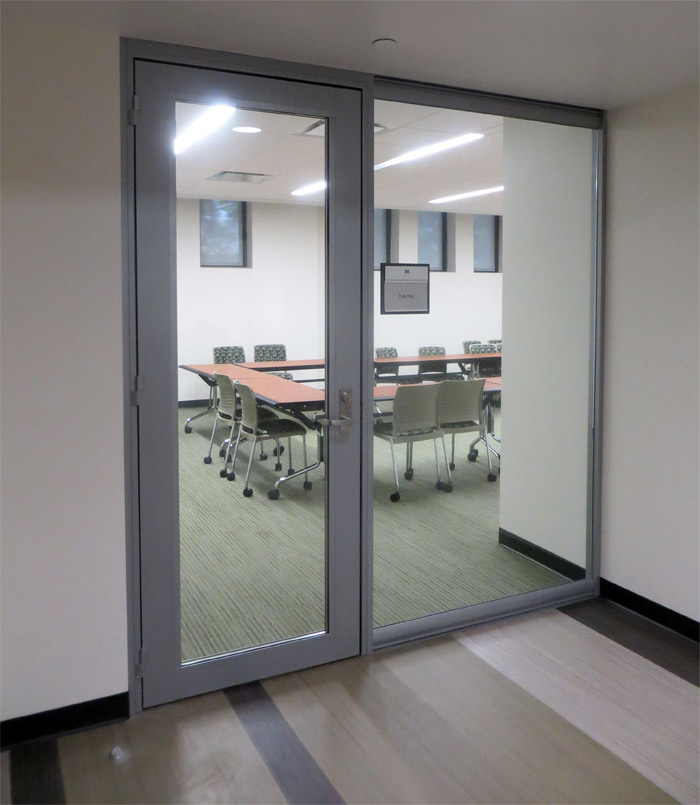 University conference/huddle room glass wall fronts with swing door glass insert #0287
