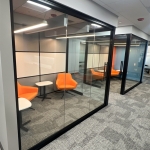 View Series glass fronts with black frame finish with Flex Series whiteboard fabric tackable panels #1836