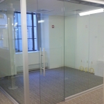 Glass office with sliding full height door #0105