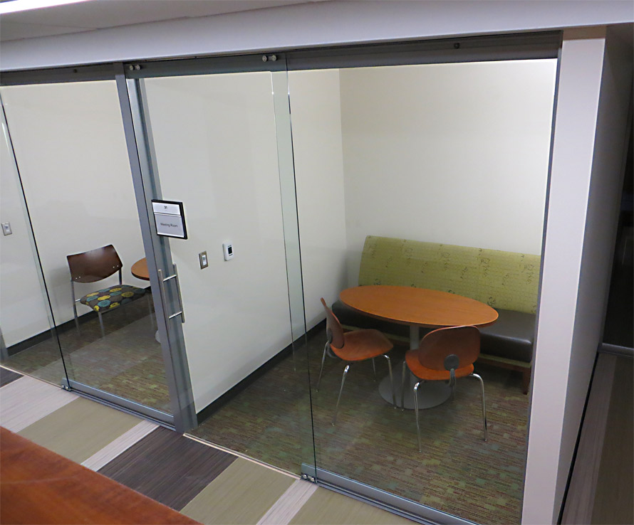 Full height sliding glass office doors in College University wall application #0294