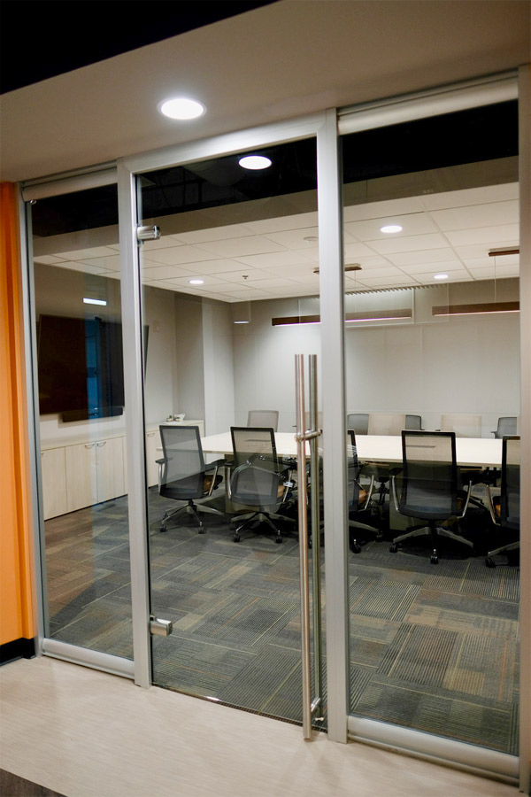 glass door with locking door pull meeting room