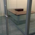 Bank glass wall installation with locking barpull sliding doors #1222