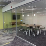 Conference room with modern glass walls and sliding glass door #1678