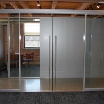 Double frameless glass sliding doors - conference room #0957