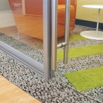 Frameless glass swing door with barpull door hardware - detail #0959