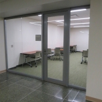 Center mounted seamless glass office (Higher Education) #0291