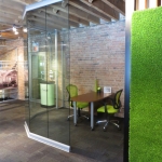 Curved Glass Open Office with SYNZoysia Platinum 300 wall panel