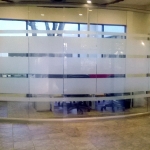 Full height glass conference room with curved wall and glass swing door - View series #0481