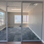 glass wall office with glass slab swing door #1555