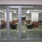 Reversible aluminum framed glass office door #0299