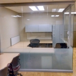 Seamless glass office with privacy film at bottom of glass panels #0643