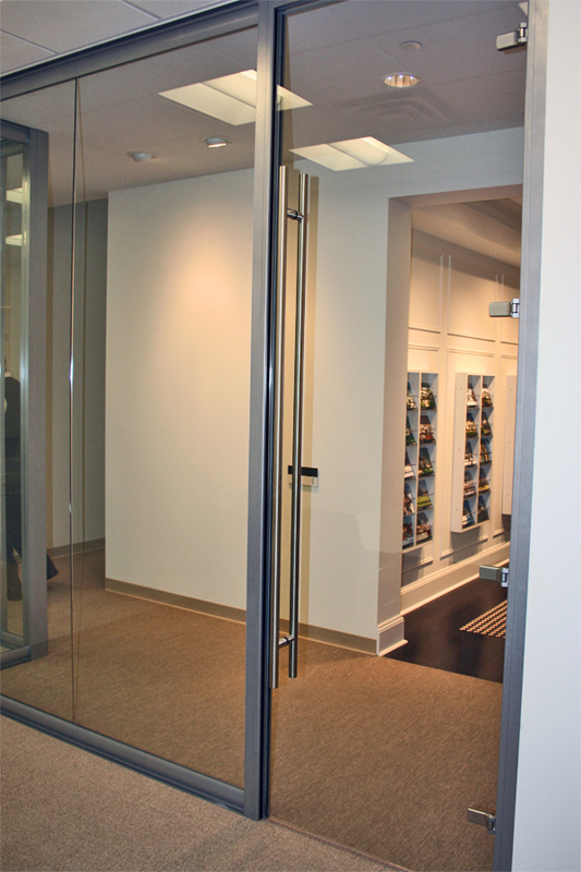 View series glass front with full-height frameless swing door #0123