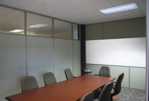 demountable wall solid fabric clerestory window with white board in conference room
